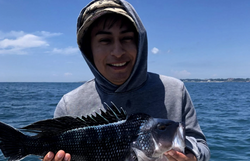 Fishing for a big sea bass in Narragansett