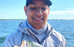 An angler fishing in RI