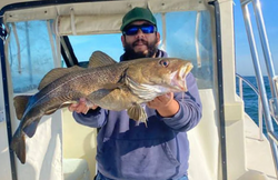 Fishing in Narragansett with a 25-inch catch