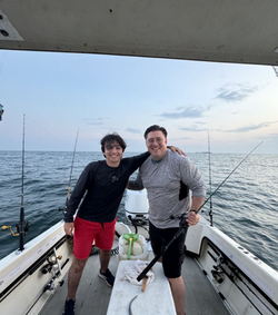 Two people fishing in Narragansett