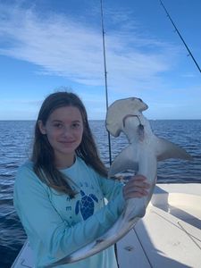 A lone fisherman with a 19-inch catch in FL