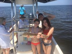 A group of 4 people fishing in FL