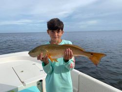 Redfish caught by two anglers in Steinhatchee, Florida