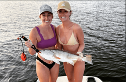 Two people fishing at Atlantic Beach