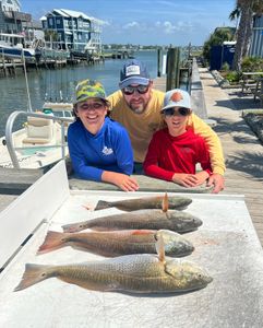3 people fishing in North Carolina