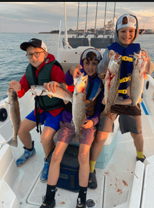 Three anglers fishing for the best catch at Atlantic Beach