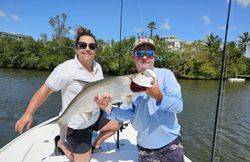 Two anglers fishing for a tarpon in Florida