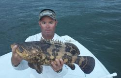 Angler holding a 22-inch fish in FL