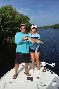 Two anglers with a 19-inch catch in Naples, Florida