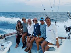 Fishing charter boat on open ocean waters near Manteo NC with group ready for offshore fishing