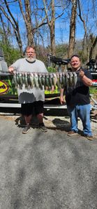 Two people fishing in Lowell