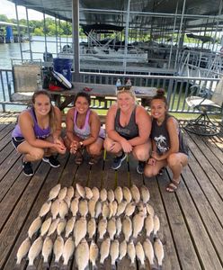 4 people enjoying a fishing trip in TX