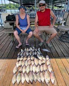 Two people fishing in Quinlan