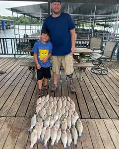 A photo of 2 people fishing in TX