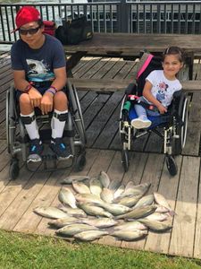 2 people fishing in TX