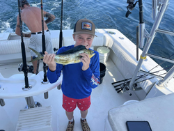 Angler catching a fish in Destin
