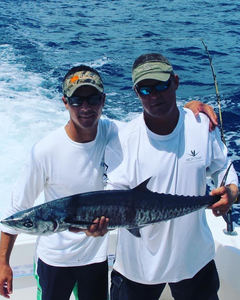 Two people fishing in Destin