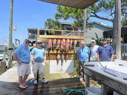 Group of 5 people fishing in Destin