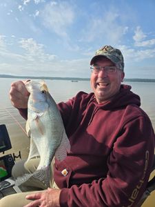 Angler with fishing rod in MS