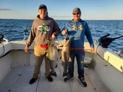 Two anglers fishing for best great catch in Manistee