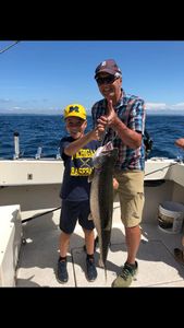 Big fish caught by two anglers in Manistee