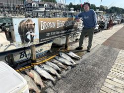 Angler enjoying a day of fishing in Manistee