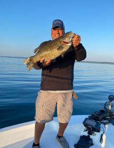 A lone angler enjoying a fishing trip in Michigan