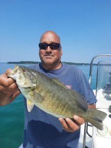 Photograph of a 21-inch Smallmouth Bass caught while fishing in MI