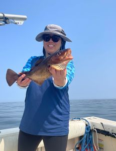 A person enjoying a fishing tour in Hingham