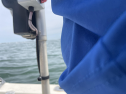Jigging and trolling in Hingham's partly cloudy waters - the best fishing adventure!
