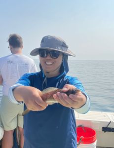 A person fishing in Hingham