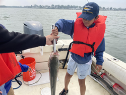 Partly cloudy skies set the stage for an exciting day of deep sea fishing!
