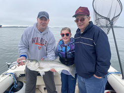 Reeled in a hefty striped bass with some expert deep sea, jigging, and trolling techniques!