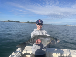 Nice striped bass using deep sea jigging and light tackle on a partly cloudy day!