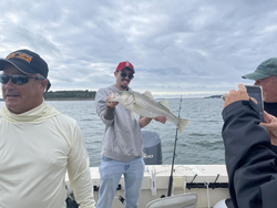 Nice striped bass using deep sea jigging and light tackle. Clearing weather made for an exciting adventure!