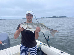 Huge 28-inch Striped Bass landed using deep sea jigging techniques!