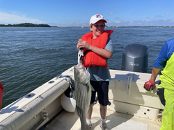 Huge Striped Bass landed while deep sea jigging!