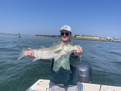 Huge Striped Bass landed during a partly cloudy day!