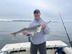That's a serious striped bass hooked on the end of the line!