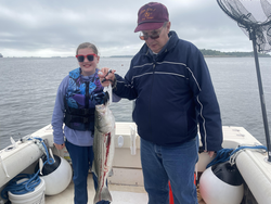 Reeled in a massive striped bass with some deep sea finesse!