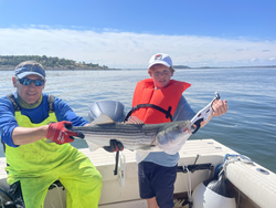 Big Striped Bass landed during a stormy afternoon!