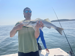 Striped Bass action in Hingham with storms on the horizon!