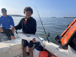 A striped bass of 27 inches reeled in after an epic fishing adventure!