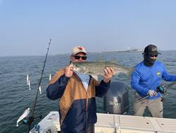 Huge Striped Bass reeled in while deep sea fishing off Hingham!