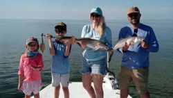 Two anglers with large fish at Crystal River