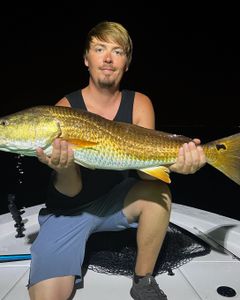 Angler with a 22-inch fish in Milton