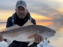 Angler with a big fish enjoying the outdoors in FL