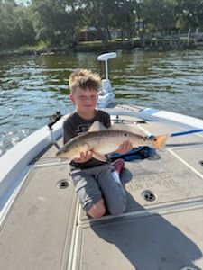 Angler with fishing rod in Milton