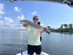 Caught the big one on a beautiful day out on the water.