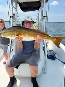 Couple enjoying fishing in Milton